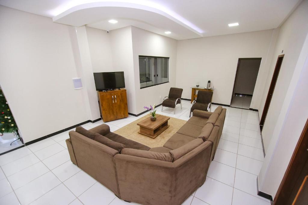 TV a/nebo společenská místnost v ubytování O Neves Hotel