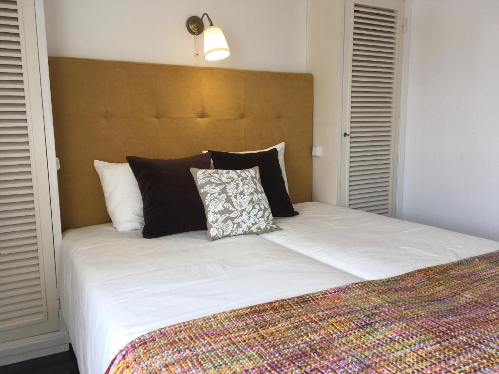 Postel nebo postele na pokoji v ubytování Hotel Ribamar