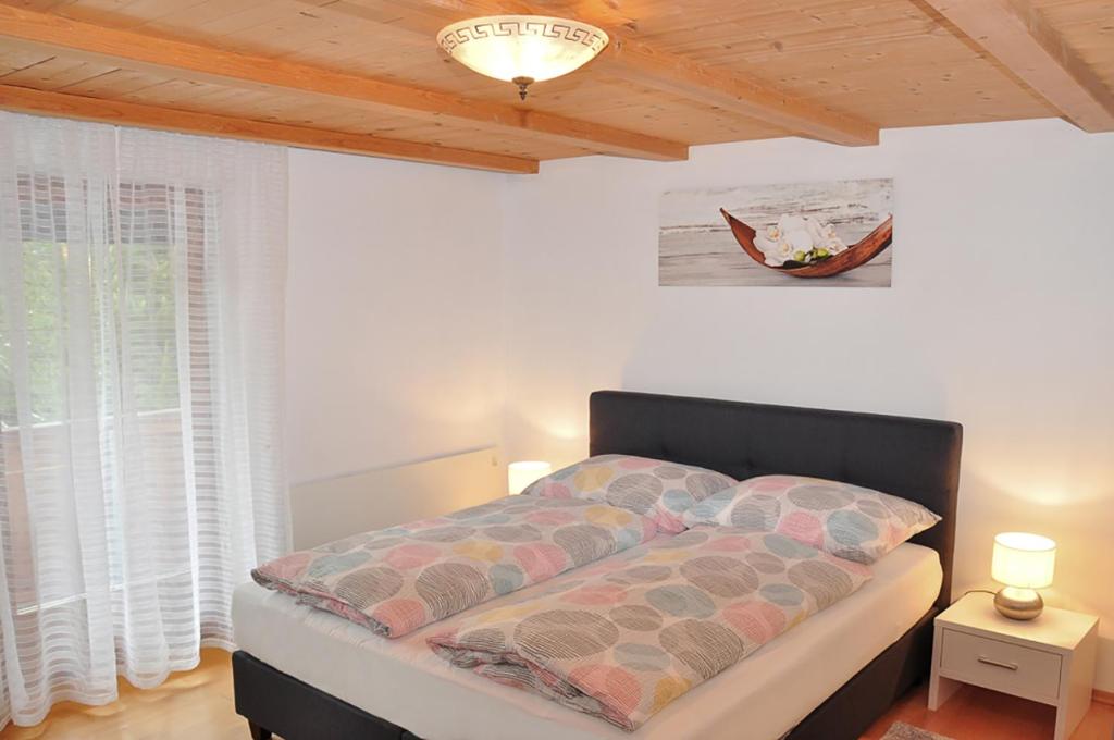 Ένα ή περισσότερα κρεβάτια σε δωμάτιο στο Ferienwohnung Vera
