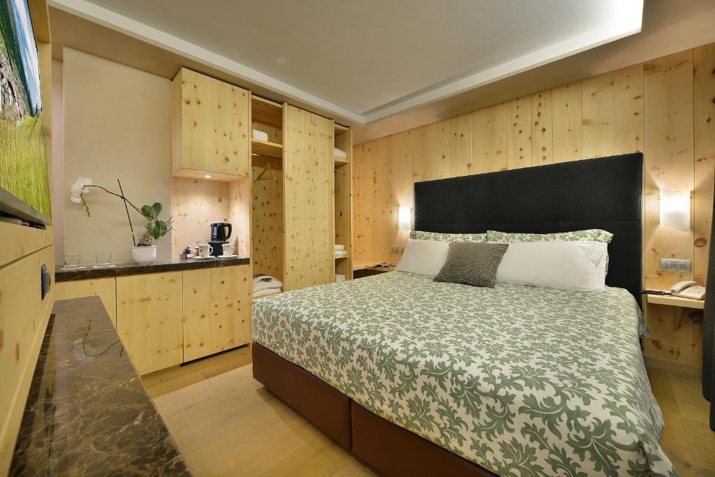 Postel nebo postele na pokoji v ubytování Hotel St. Michael