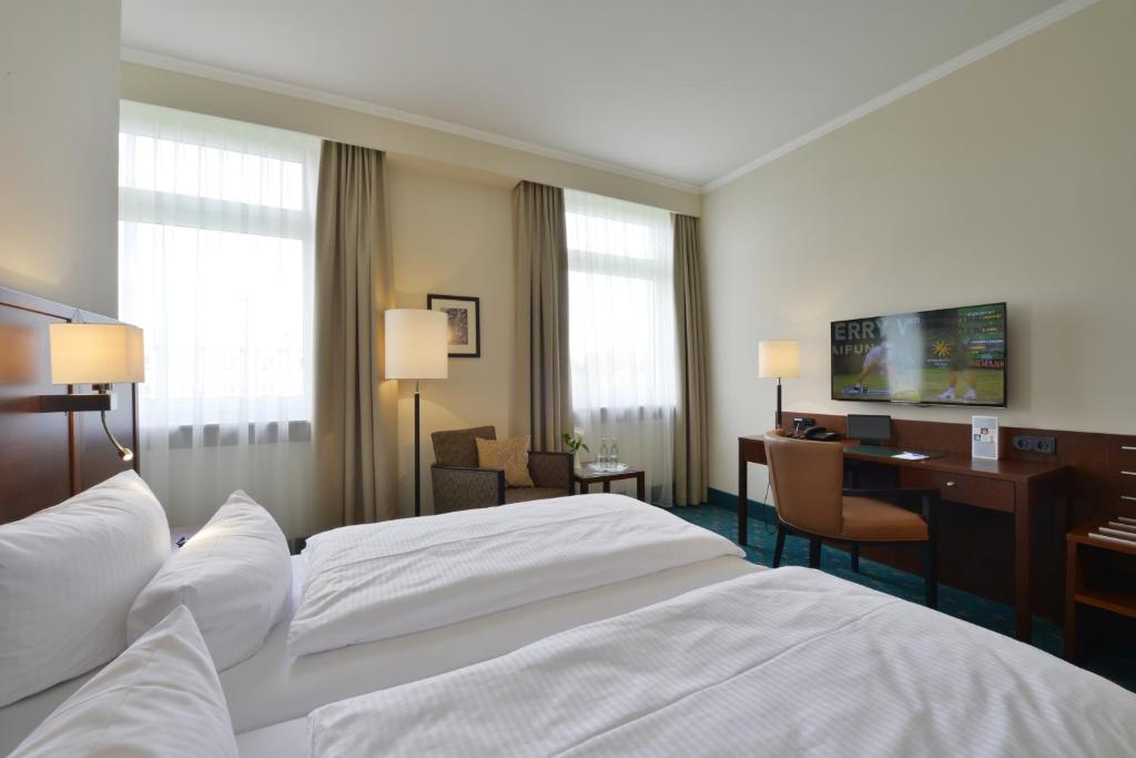 Voodi või voodid majutusasutuse Hotel Der Lindenhof toas