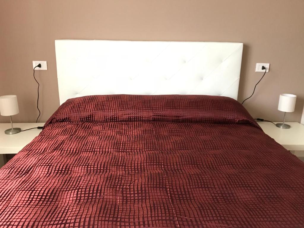Postel nebo postele na pokoji v ubytování B&B New Triscele