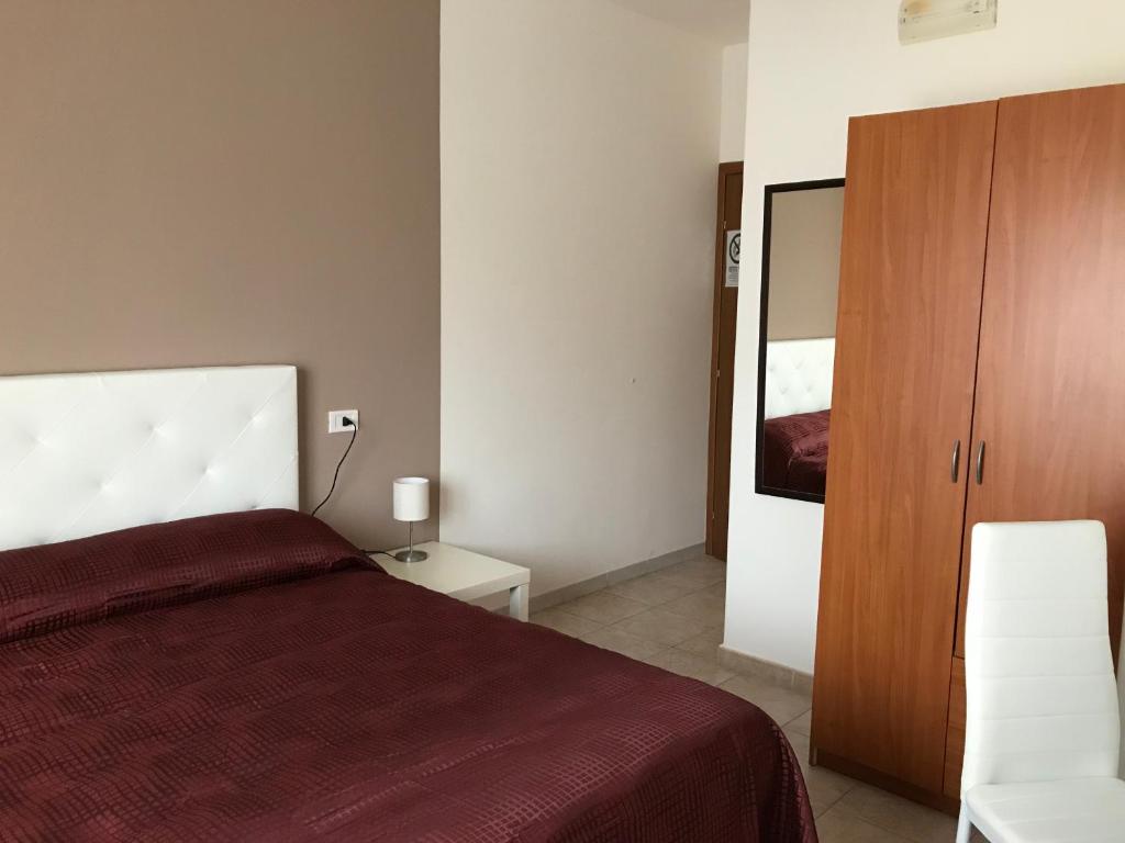 Postel nebo postele na pokoji v ubytování B&B New Triscele