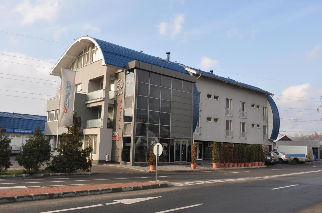 a building on the side of a street at Euro House Hotel in Baia Mare