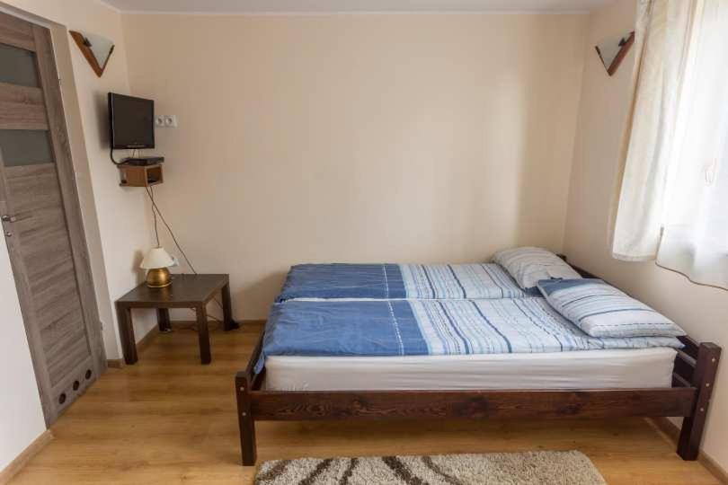 Posteľ alebo postele v izbe v ubytovaní Pokoje Gościnne "Spokojna 10" 600-065-145