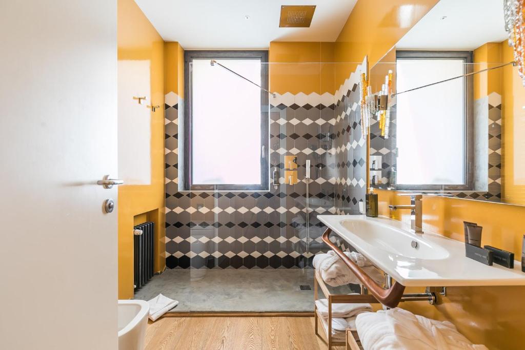 Kuchyň nebo kuchyňský kout v ubytování Rarity Suites