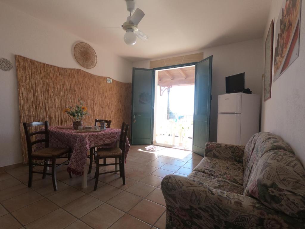 TV a/nebo společenská místnost v ubytování Appartamento Sul Mare