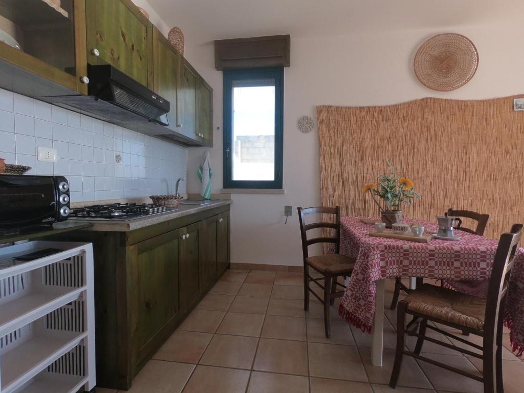 Kuchyň nebo kuchyňský kout v ubytování Appartamento Sul Mare