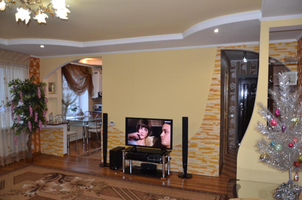 TV a/nebo společenská místnost v ubytování Lupova Home