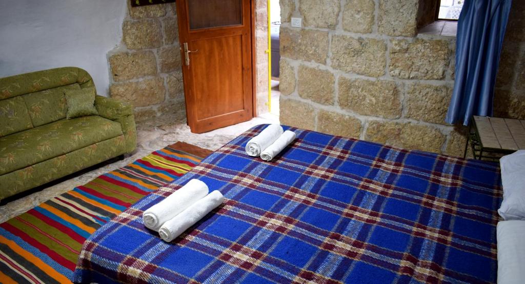 Postel nebo postele na pokoji v ubytování Hosh Al Subbar