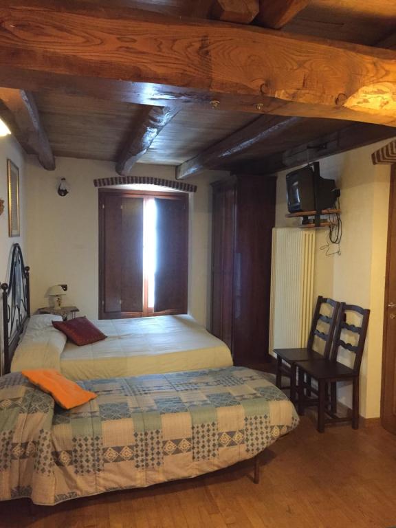 Postelja oz. postelje v sobi nastanitve osteria b&b il barcollo