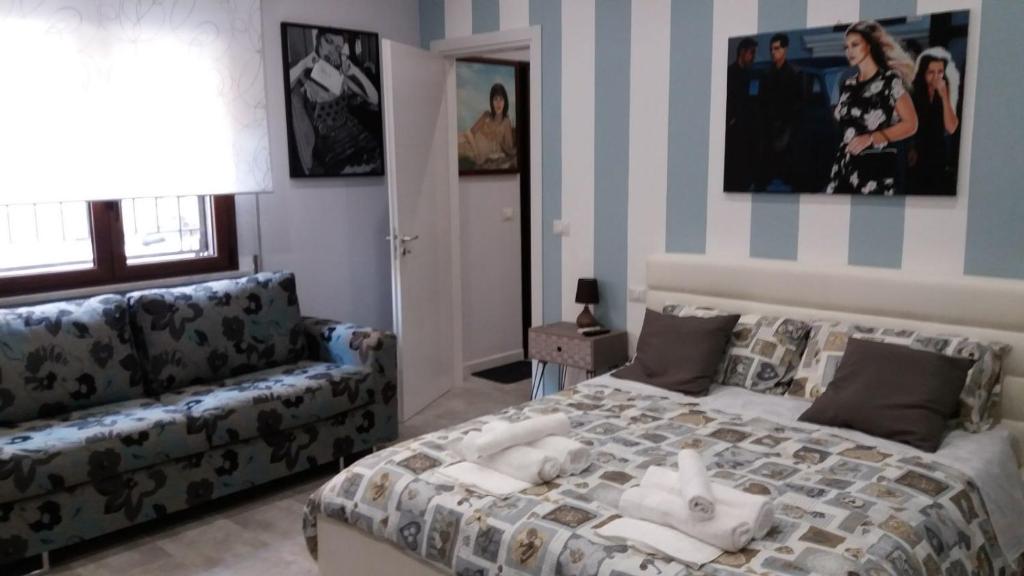 A bed or beds in a room at B&B A casa dell'artista
