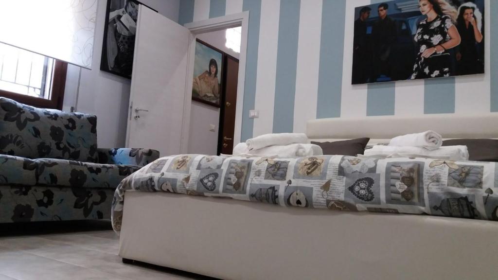 A bed or beds in a room at B&B A casa dell'artista