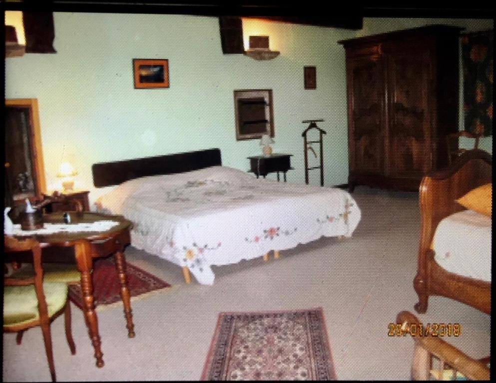 Postel nebo postele na pokoji v ubytování CHAMBRES D' HOTES LA LISON