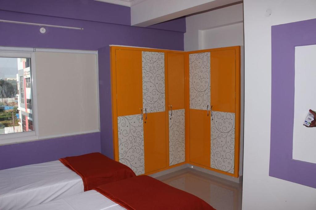 Postel nebo postele na pokoji v ubytování Mahas Inn