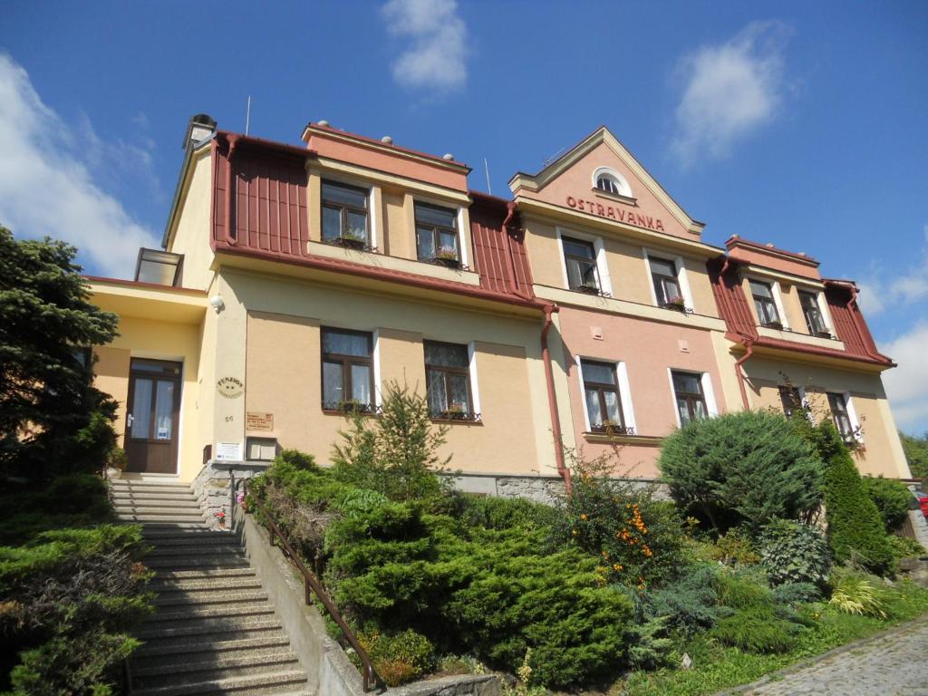 a building with stairs in front of it at Penzion Ostravanka in Hranice