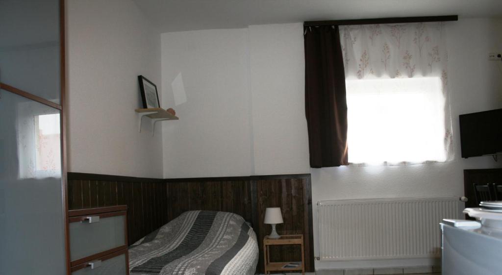 Postel nebo postele na pokoji v ubytování Fontana Vendégház