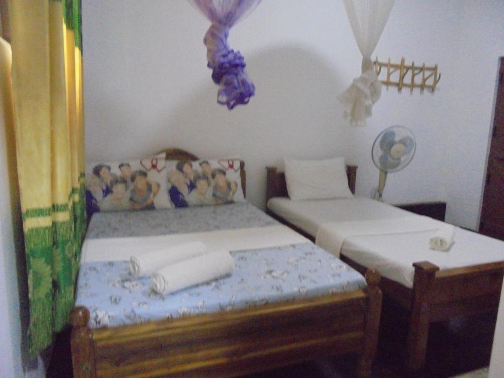 Postel nebo postele na pokoji v ubytování Ath Hala Safari Resort