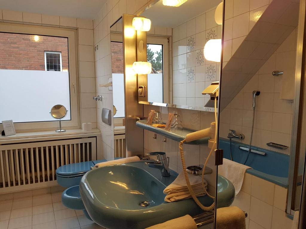Koupelna v ubytování Hotel Villa Verde