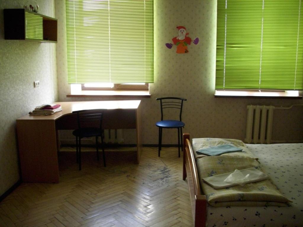 Postel nebo postele na pokoji v ubytování Yaroslav Hostel