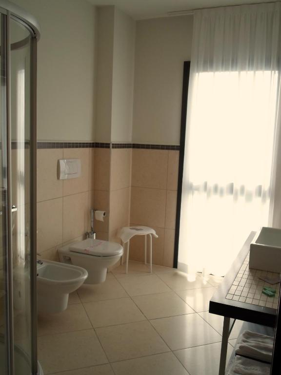 Koupelna v ubytování Hotel Le Macine