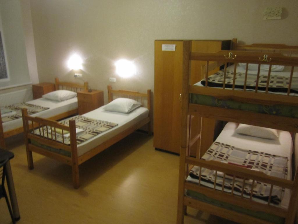 Postel nebo postele na pokoji v ubytování Yaroslav Hostel