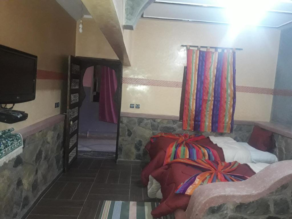 Postel nebo postele na pokoji v ubytování Hotel France Ouzoud
