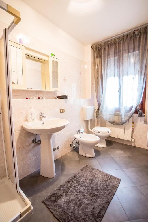 Koupelna v ubytování Adria Bella Locazione Turistica