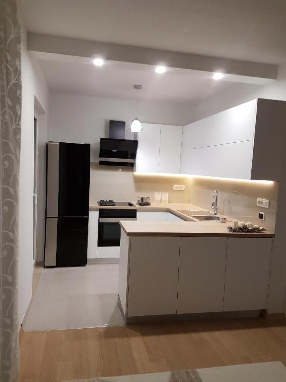 Kuchyňa alebo kuchynka v ubytovaní Apartmani Drago