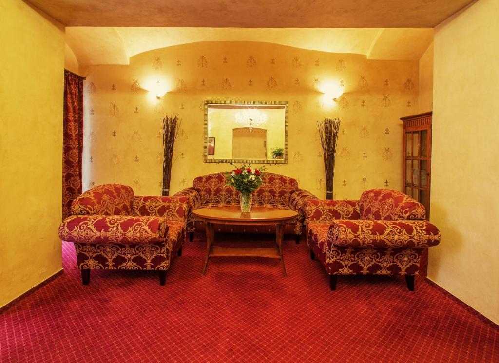 Posezení v ubytování Hotel Rous