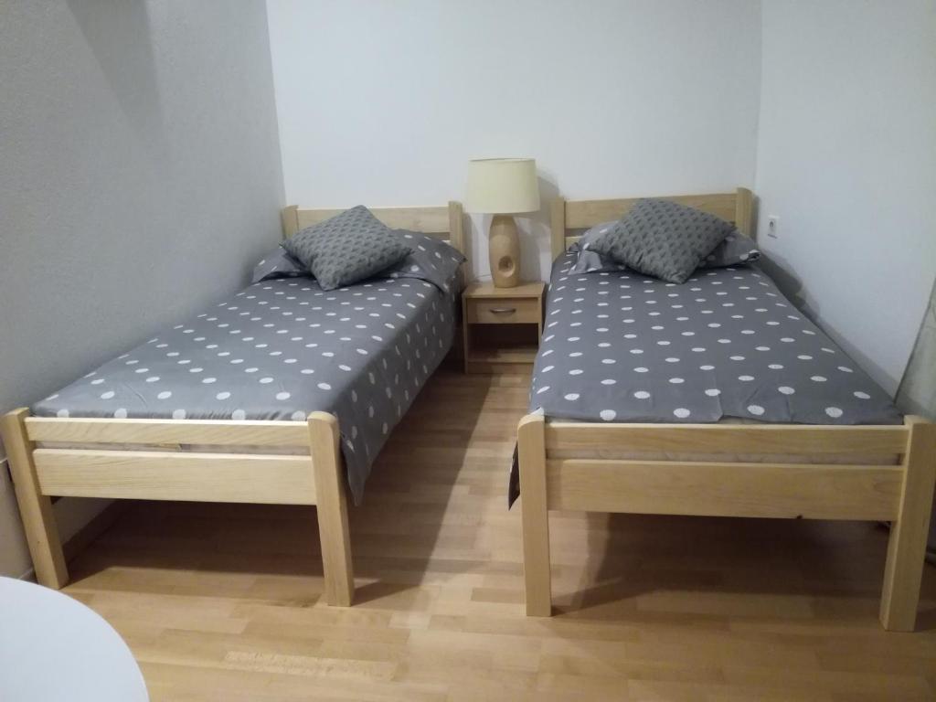 Postel nebo postele na pokoji v ubytování Guest House Kvartin