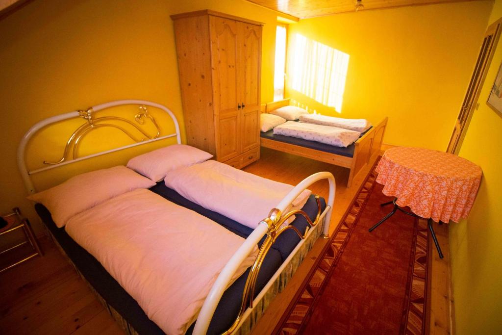 Posteľ alebo postele v izbe v ubytovaní Penzion HACIENDA