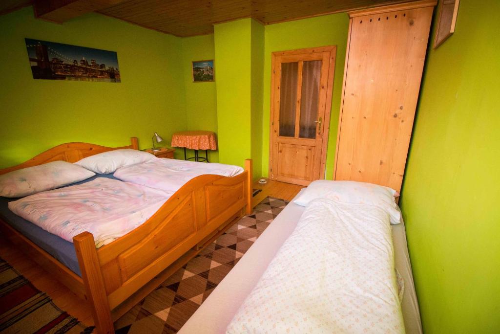 Posteľ alebo postele v izbe v ubytovaní Penzion HACIENDA