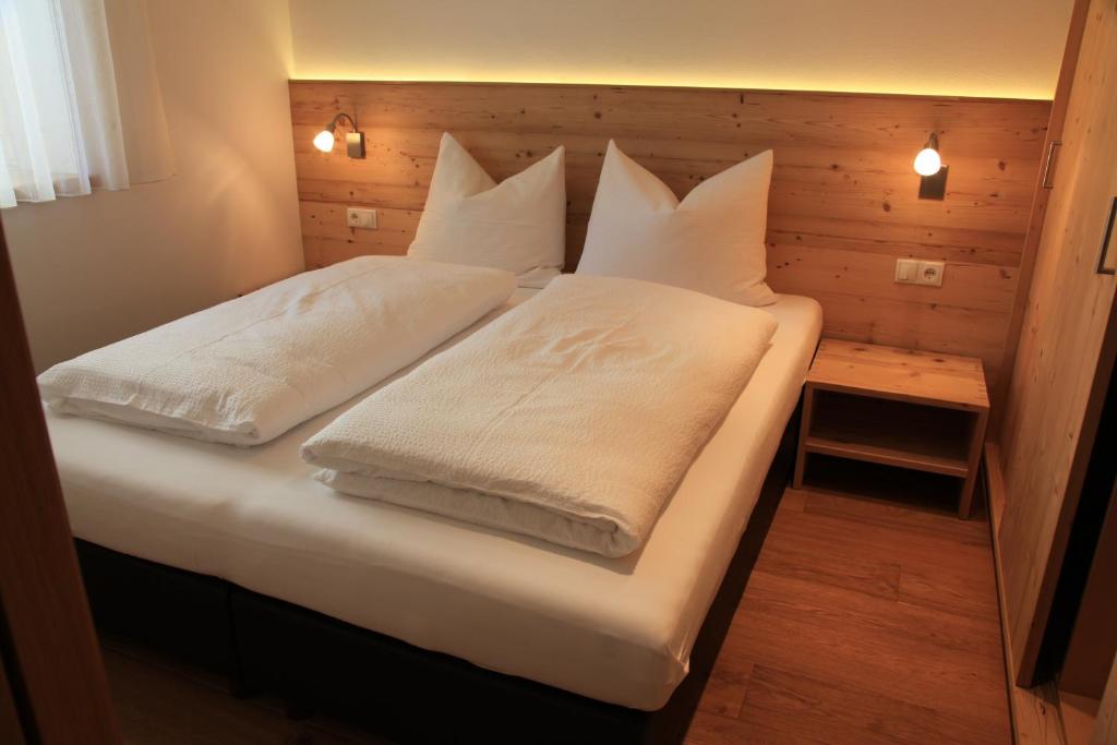 Postel nebo postele na pokoji v ubytování Appartements Mutschlechner