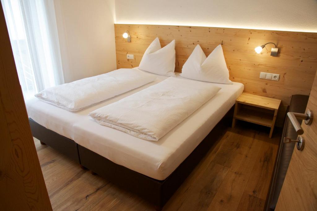 Postel nebo postele na pokoji v ubytování Appartements Mutschlechner