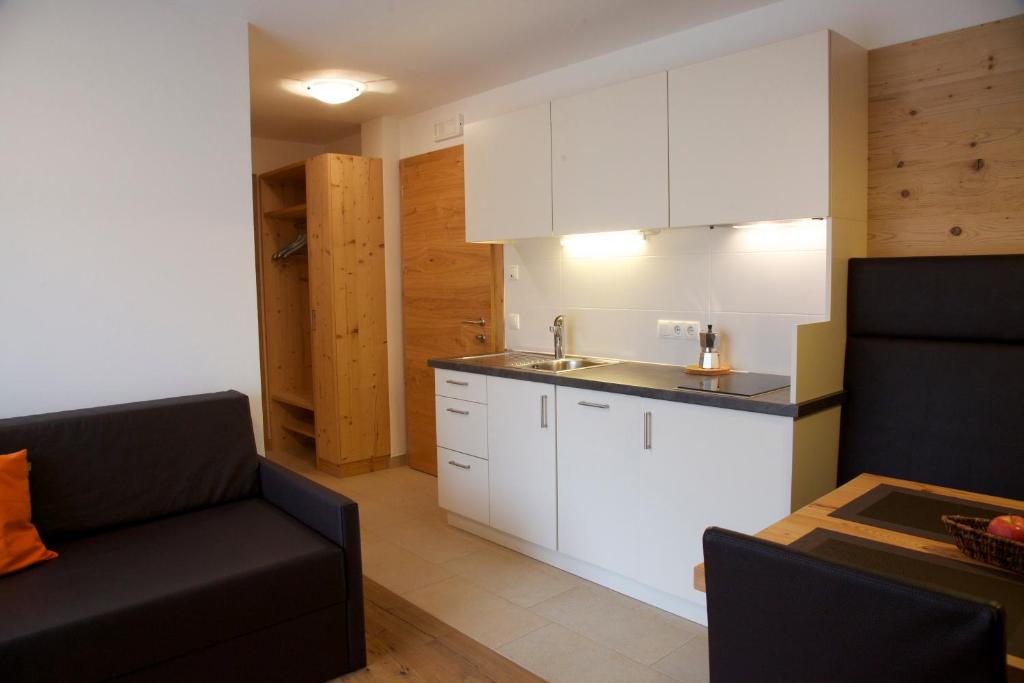 Kuchyň nebo kuchyňský kout v ubytování Appartements Mutschlechner