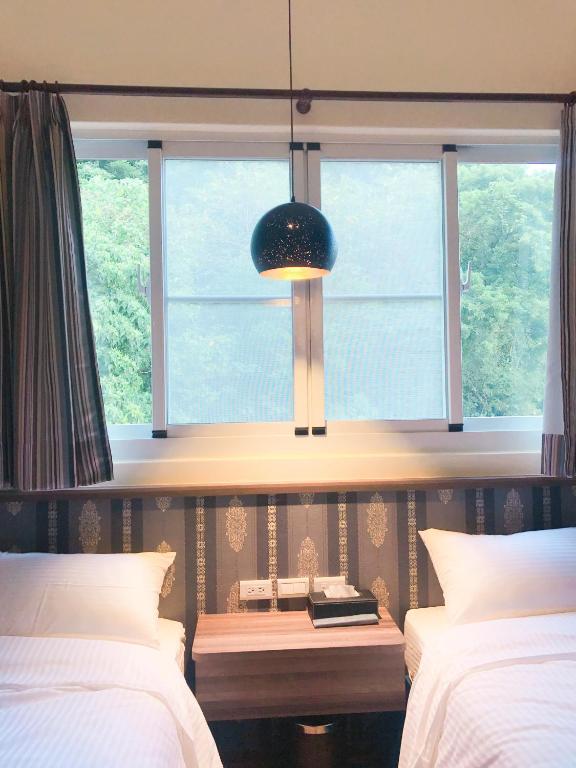 Postel nebo postele na pokoji v ubytování Wang yuan B&B