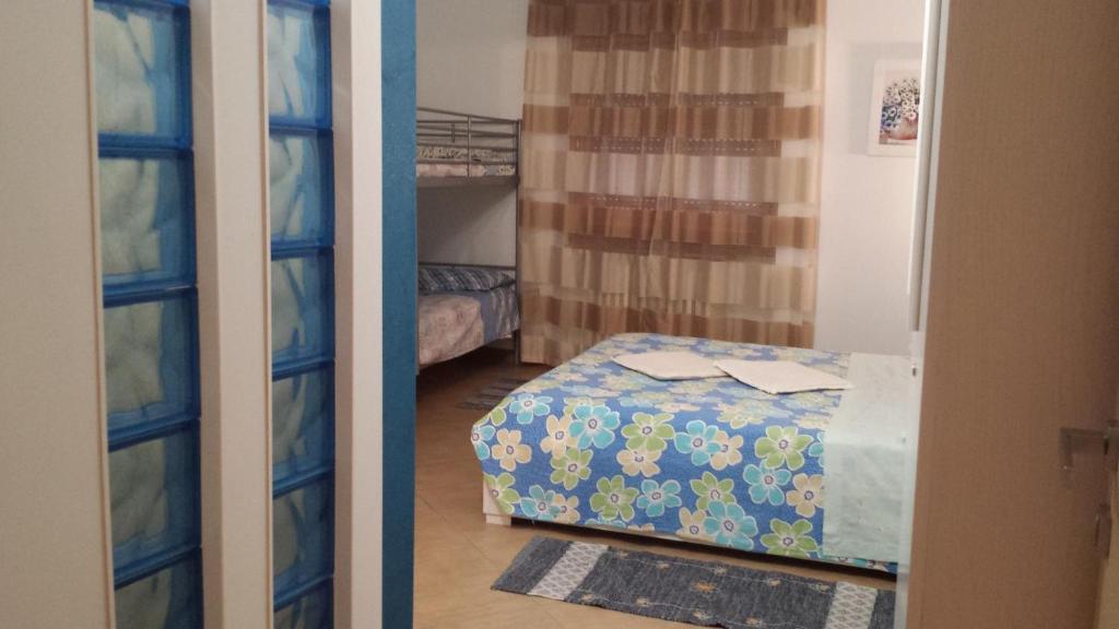Postel nebo postele na pokoji v ubytování La Gemma B&B