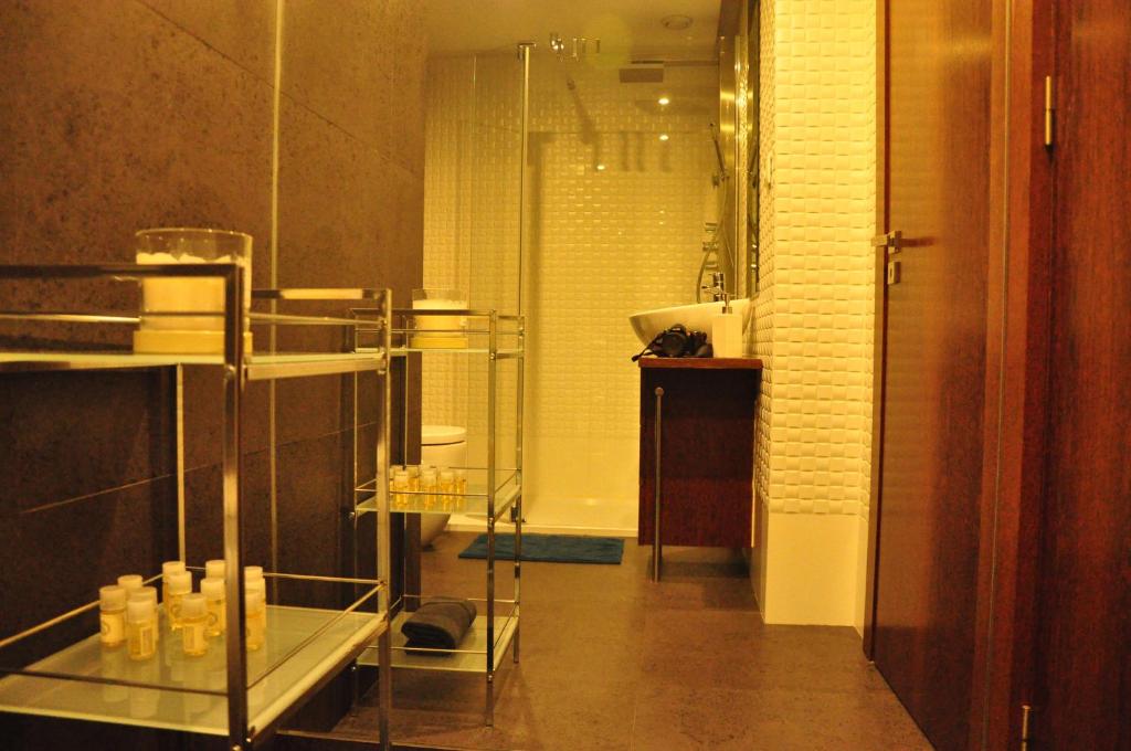 a bathroom with a shower and a sink at PicPorto Apartment in Porto