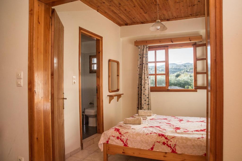 Postel nebo postele na pokoji v ubytování Niki Apartments