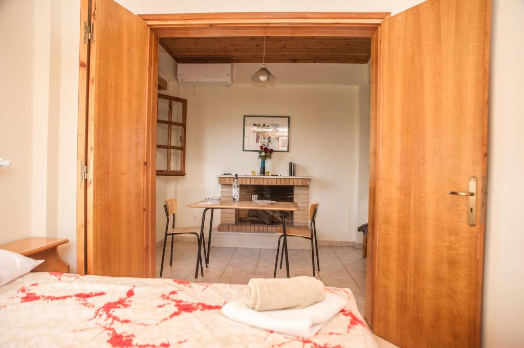 Postel nebo postele na pokoji v ubytování Niki Apartments