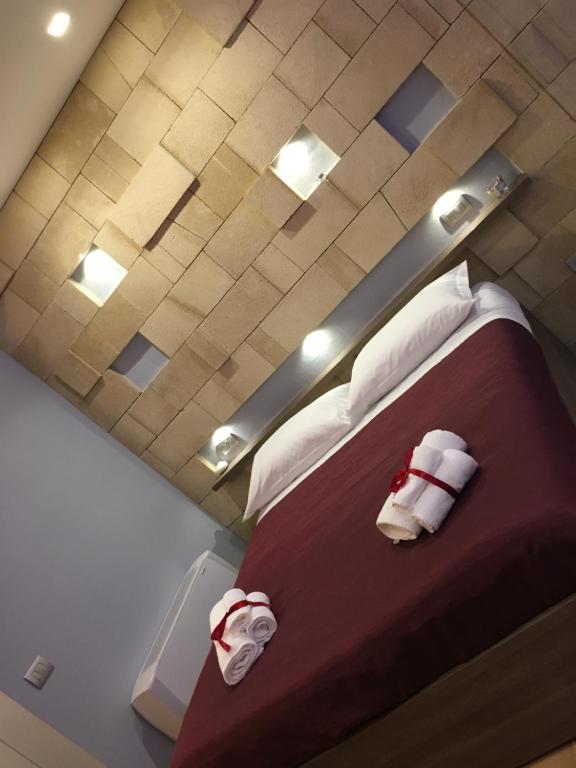 Postel nebo postele na pokoji v ubytování Mater Aquae