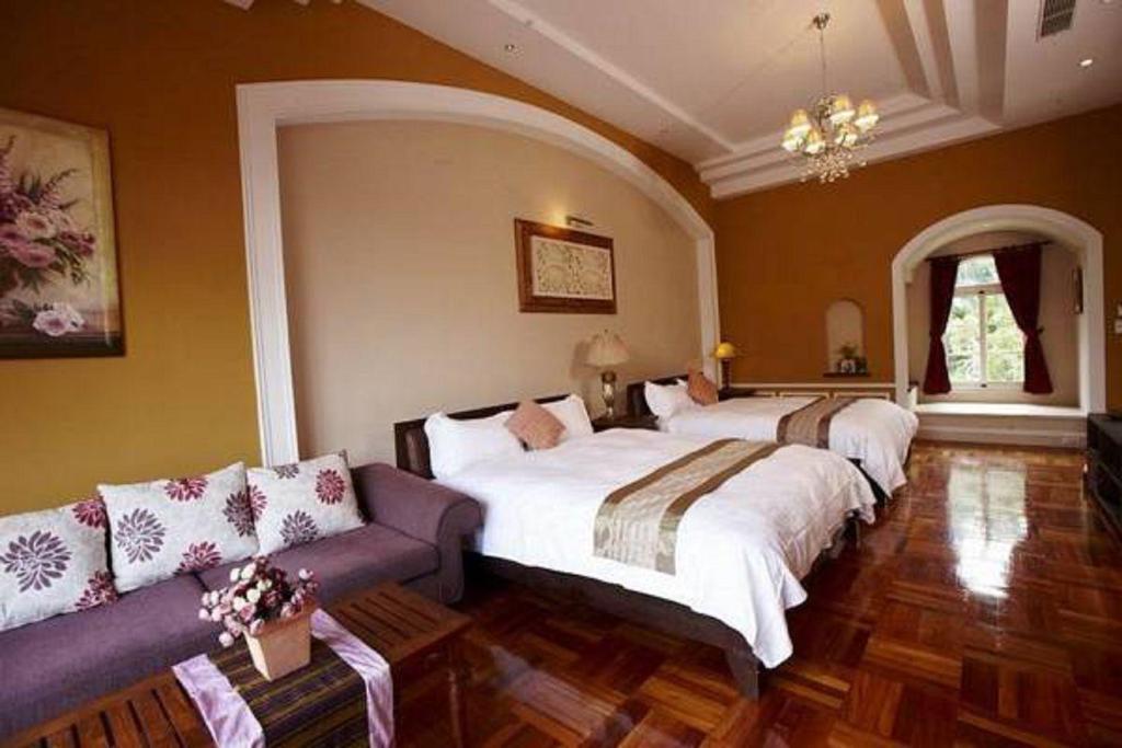 Postel nebo postele na pokoji v ubytování My Chateau Resort