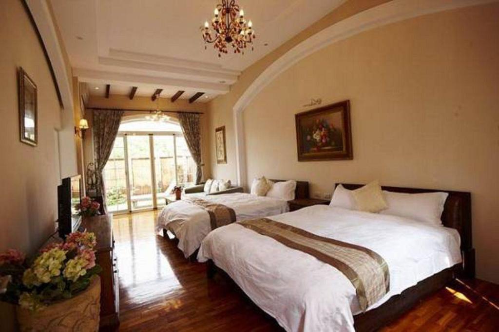 Postel nebo postele na pokoji v ubytování My Chateau Resort