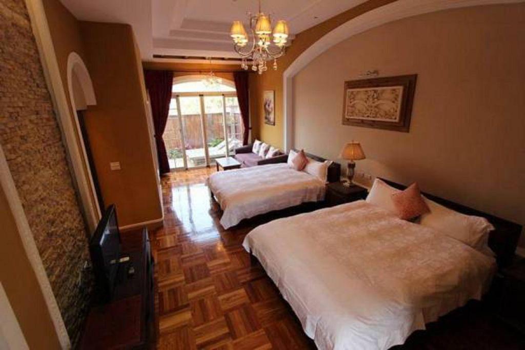 Postel nebo postele na pokoji v ubytování My Chateau Resort