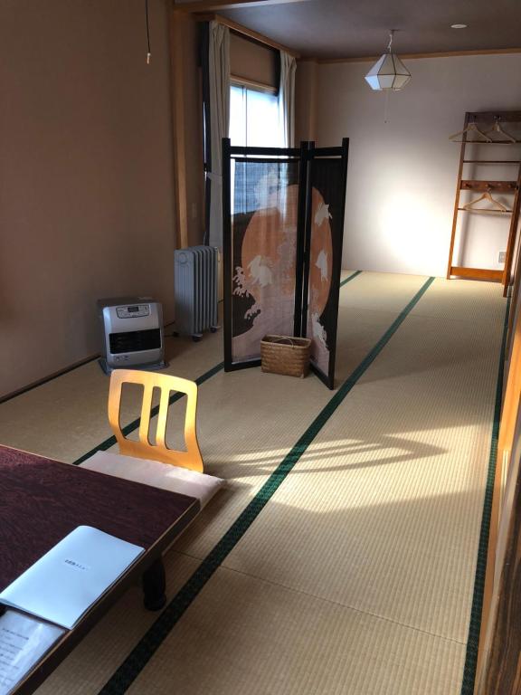 Postel nebo postele na pokoji v ubytování Shiunso