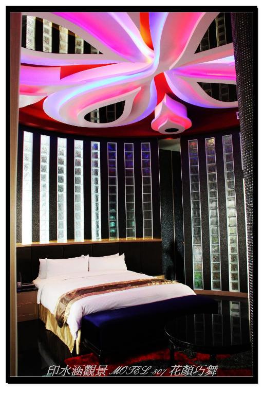 Postel nebo postele na pokoji v ubytování Yin Shui Han Motel