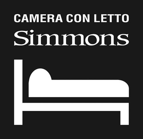 a sign that says cameraon leftrums with a white arrow at Hotel Aurora Duino in Duino