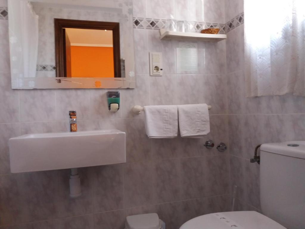 Kylpyhuone majoituspaikassa Hostal La Pilarica
