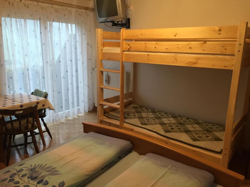 Postel nebo postele na pokoji v ubytování Haus Heimo